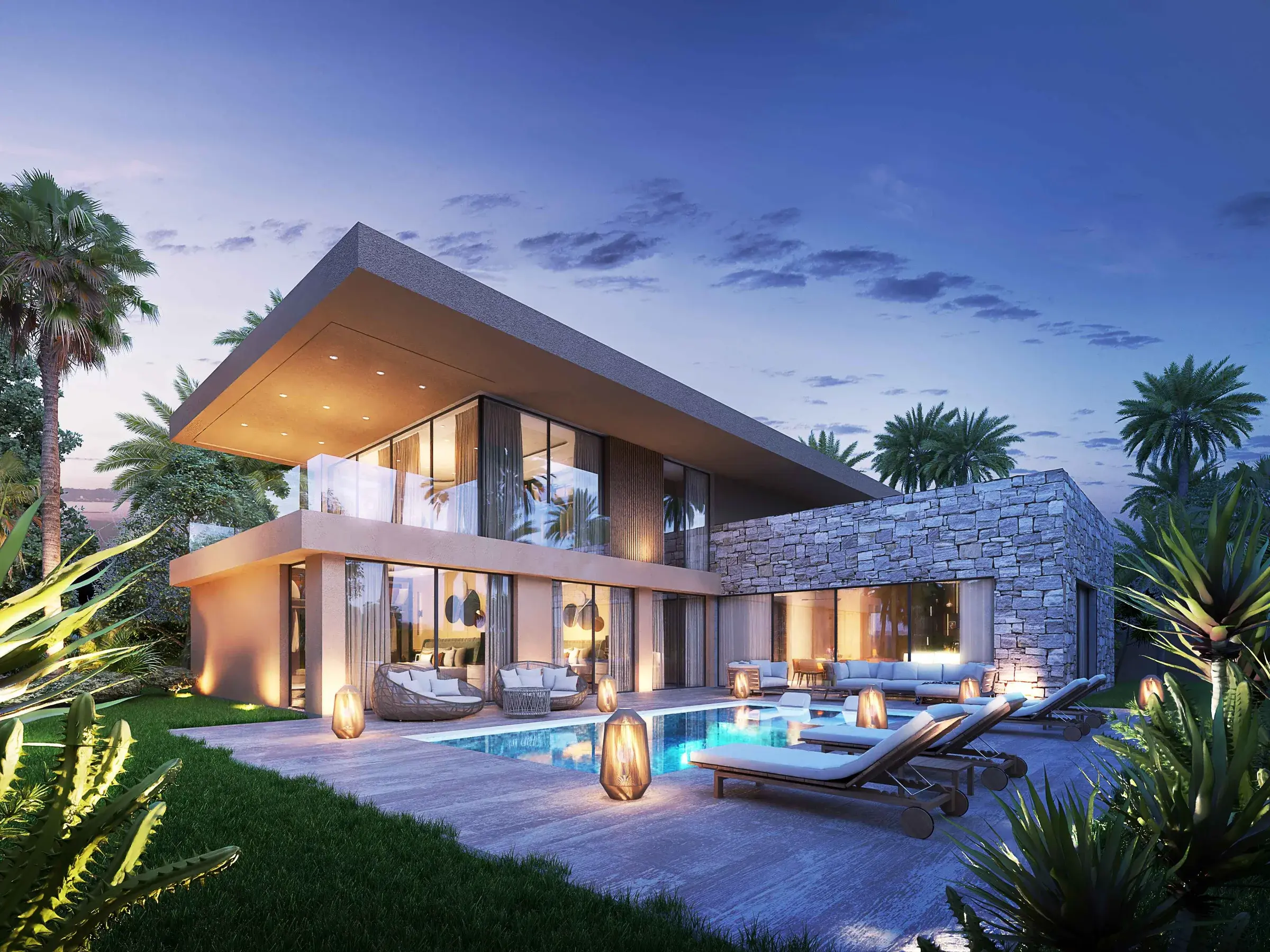Villa at dusk, lit infinity pool